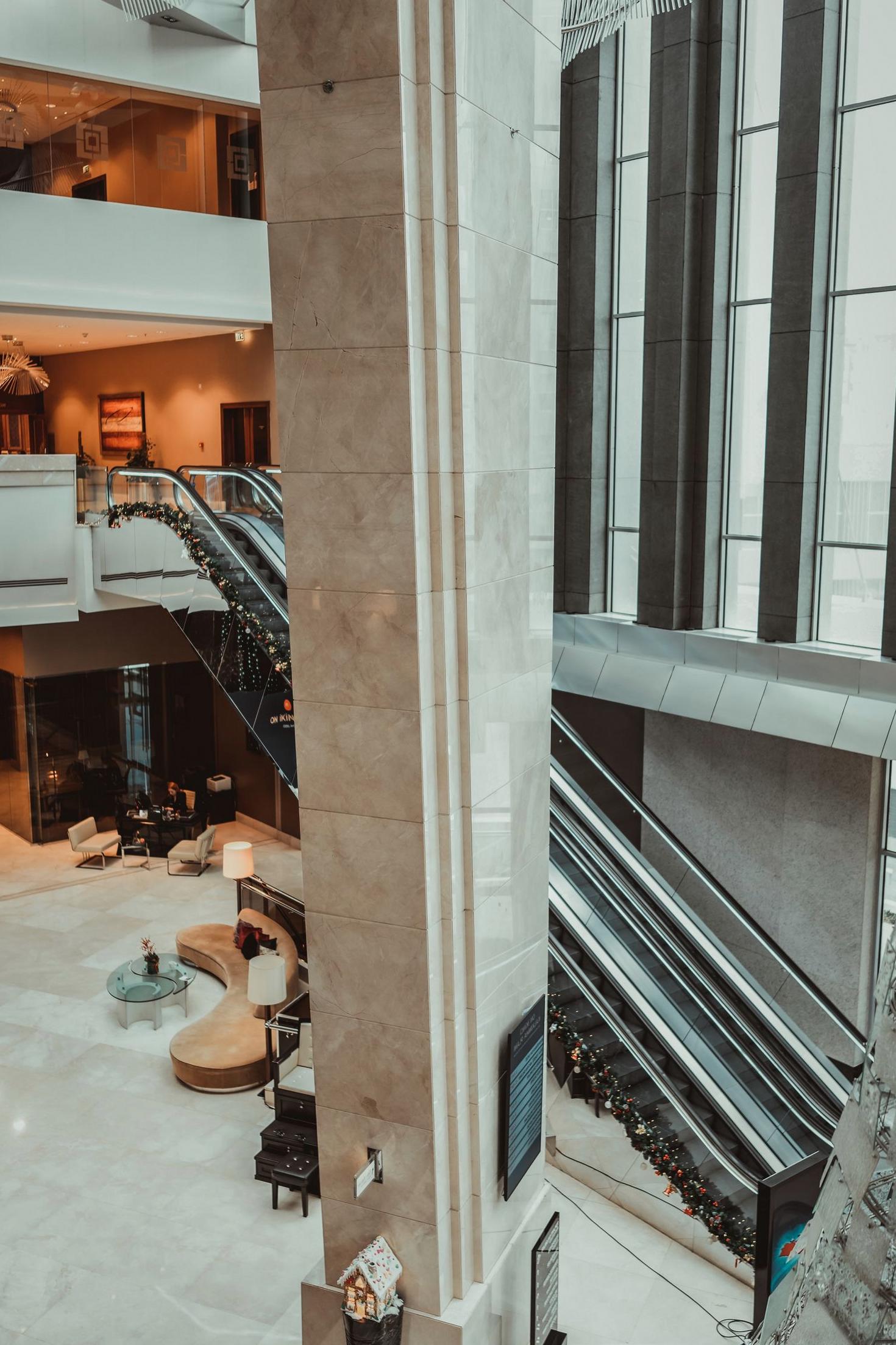Warmly lit contemporary hotel lobby