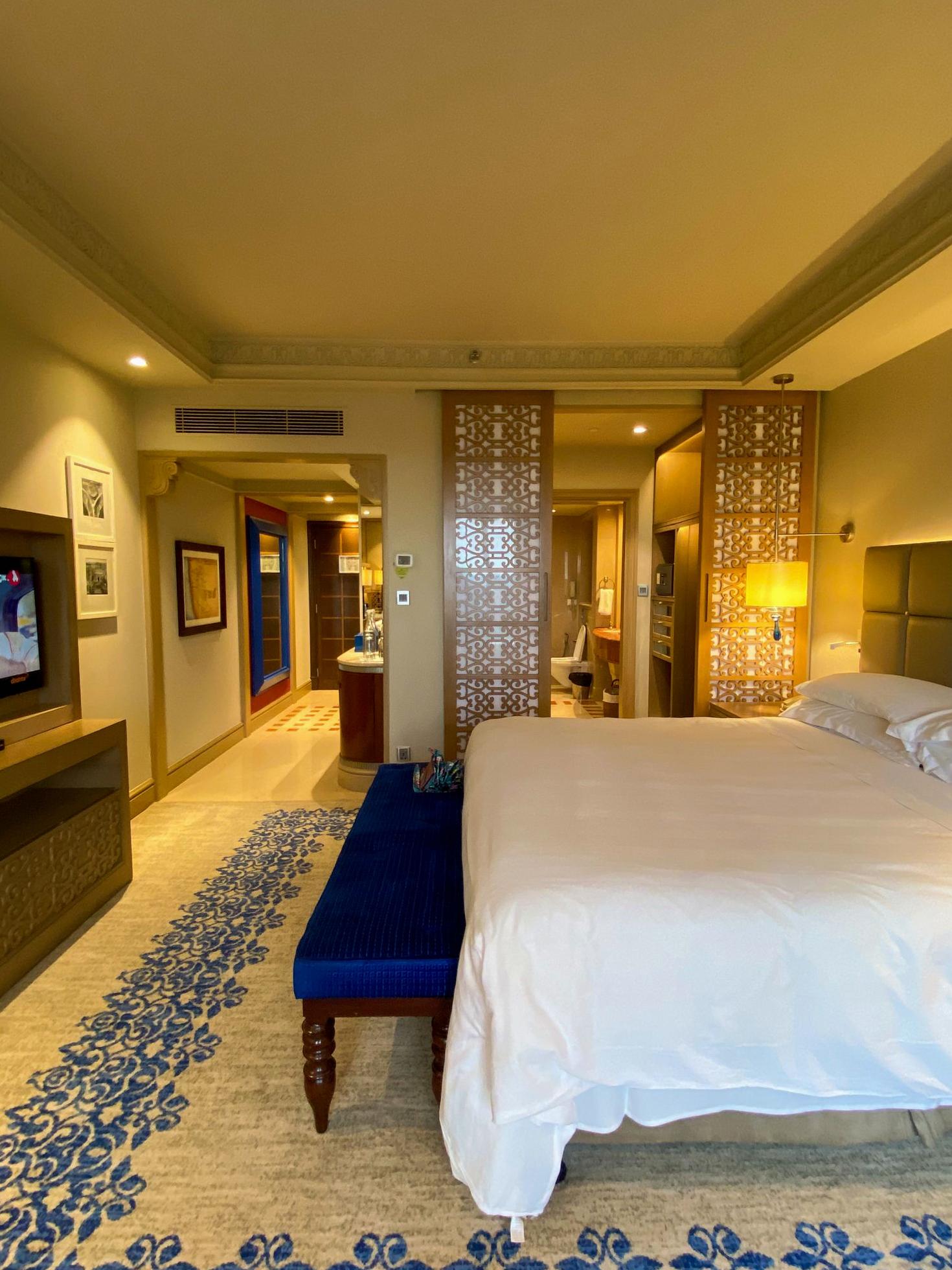 Happylivo guest using modern room amenities
